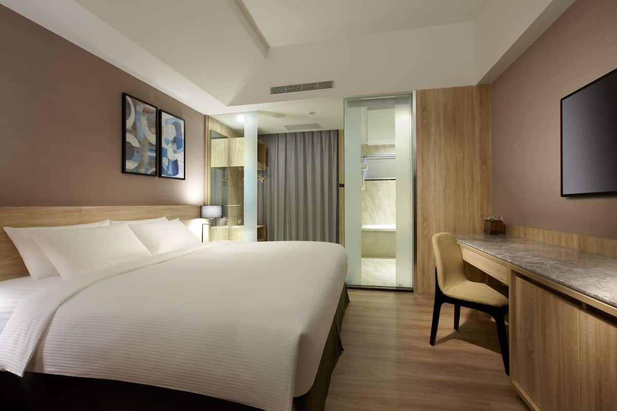 Premium bedding, down duvets, in-room safe, desk