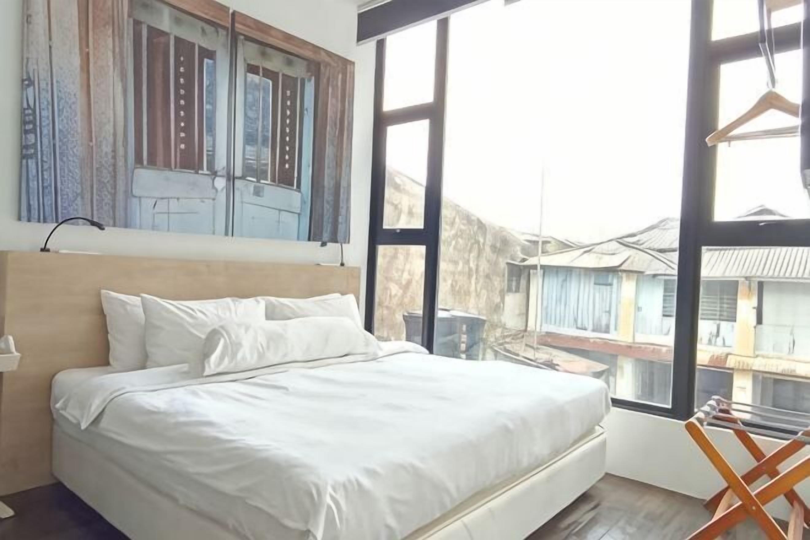 Cofres nos quartos, ferros/tábuas de passar roupa, Wi-Fi de cortesia