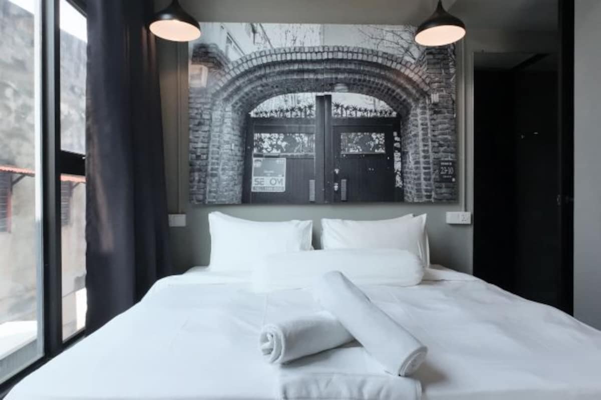 Family Suite (King + Queen Bed)