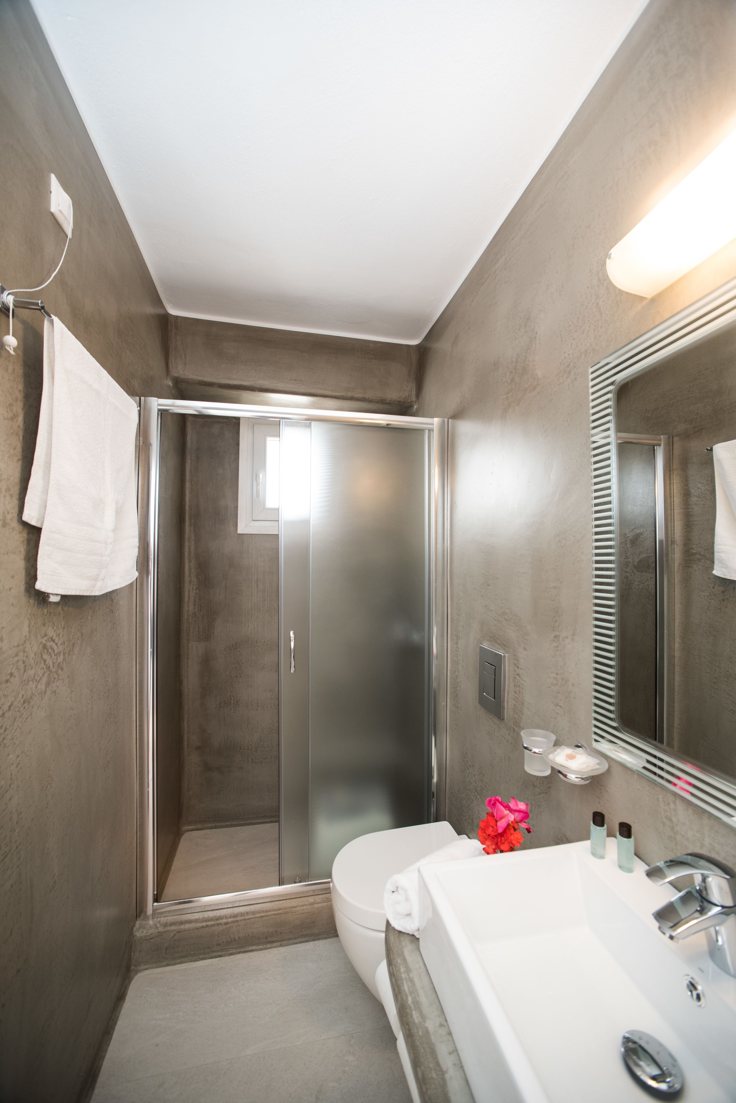 shower, eco-friendly toiletries, hair dryer, towels