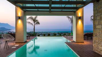 Outdoor pool, pool umbrellas, sun loungers