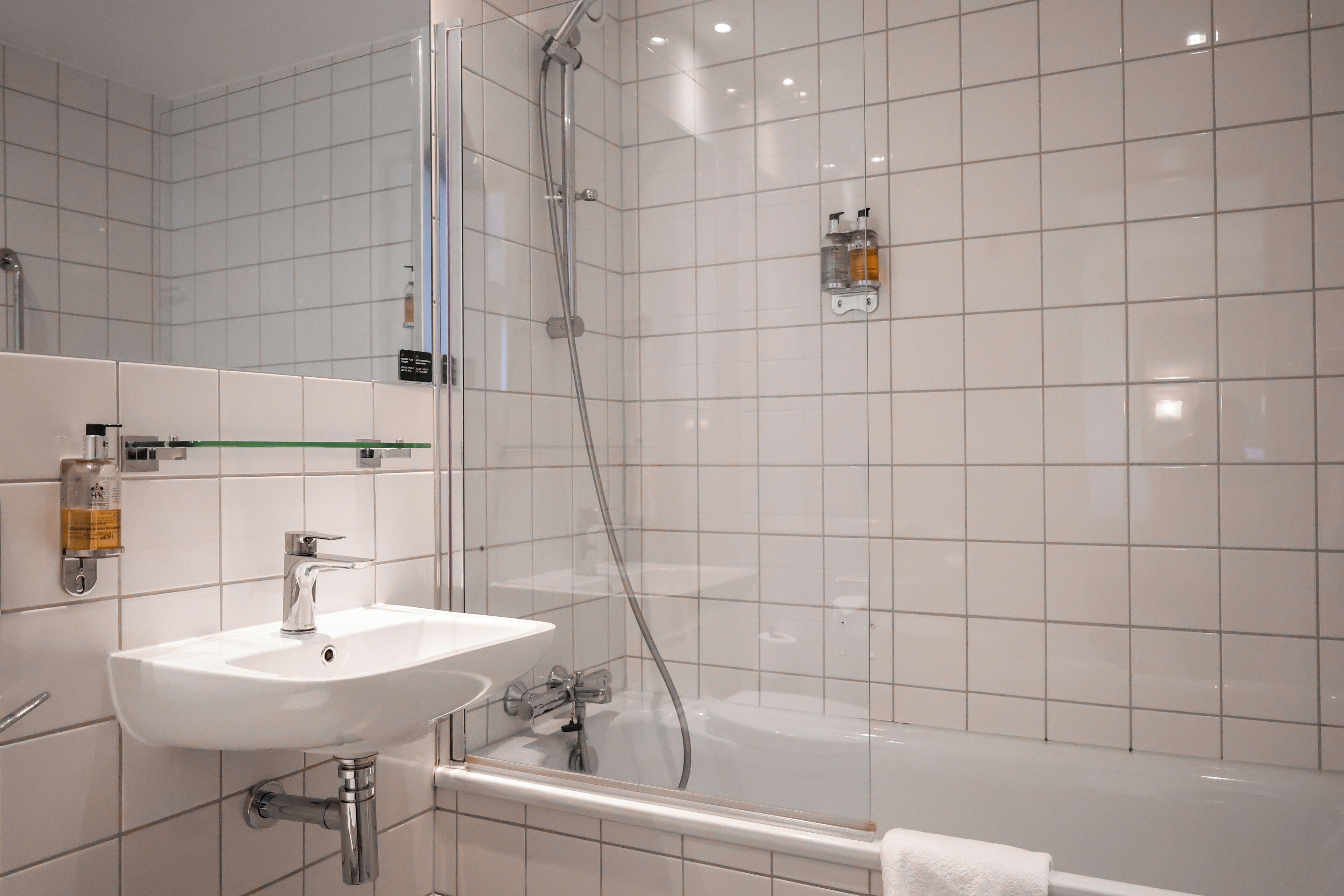 combined shower/bathtub, free toiletries, hair dryer, towels