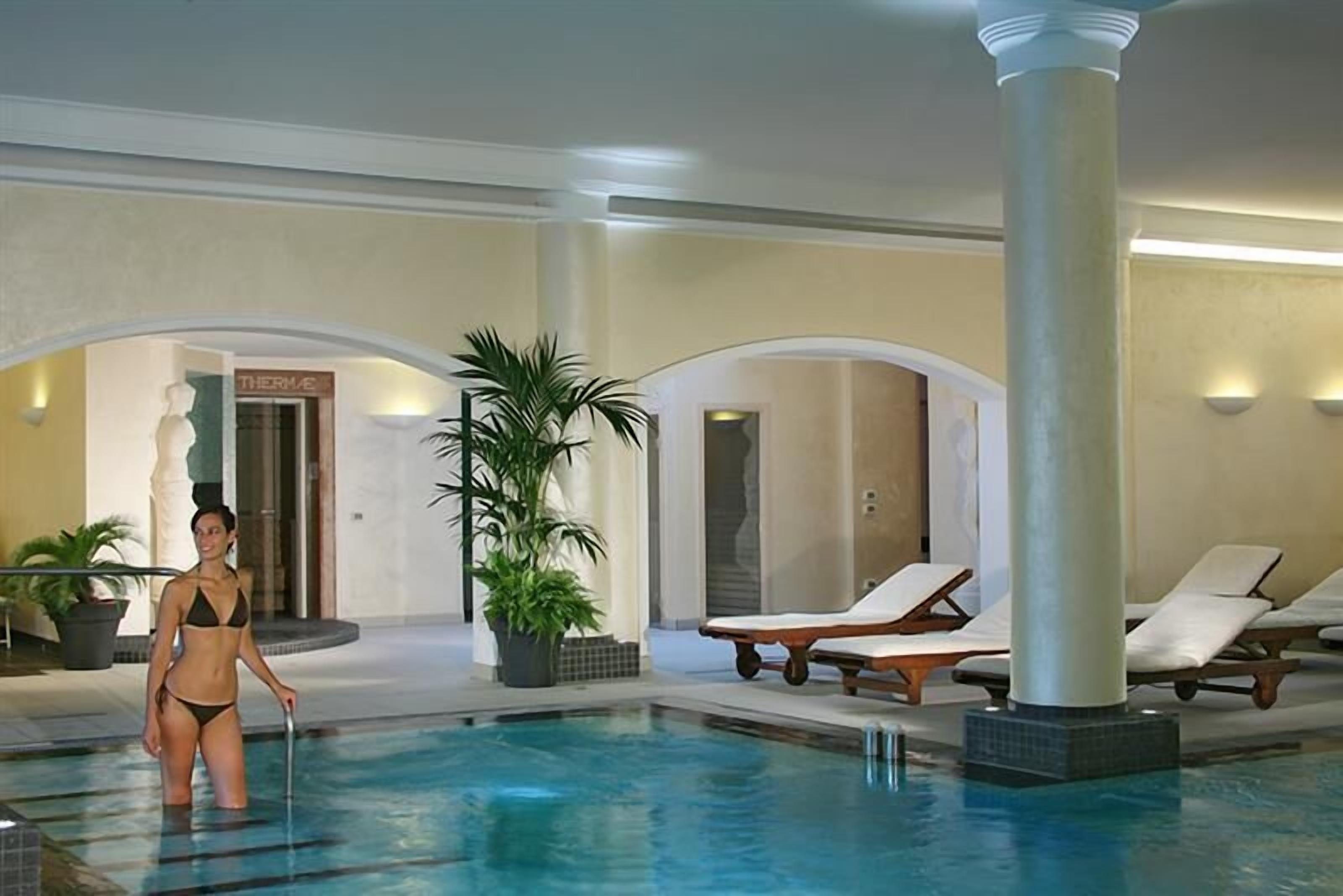 indoor pool, outdoor pool, pool loungers