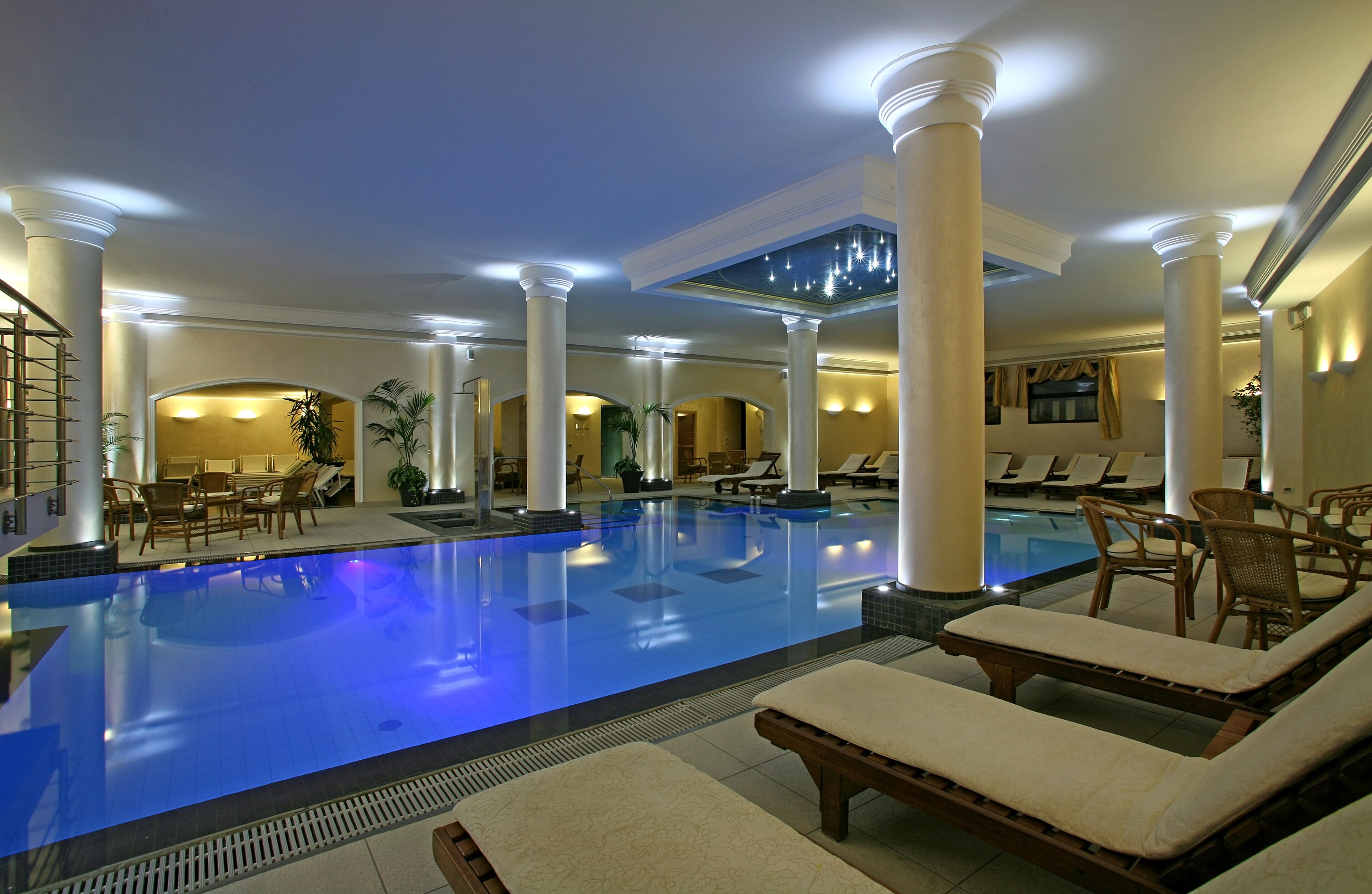 indoor pool, outdoor pool, pool loungers