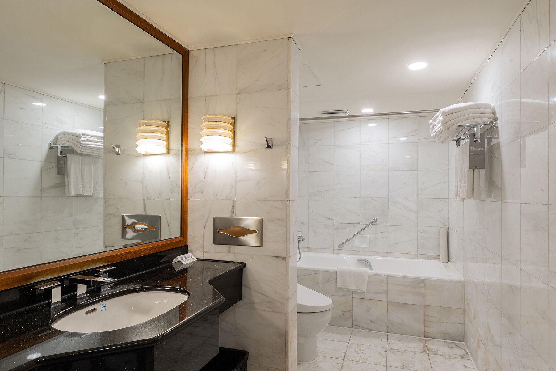 classic quadruple room | bathroom | hair dryer, towels, shampoo, toilet paper