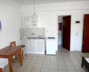 Fridge, stovetop, coffee/tea maker, cookware/dishes/utensils