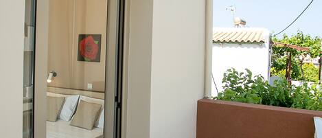 Quarto triplo standard, 1 quarto, no jardim | Terraço/pátio