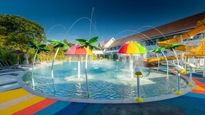 Outdoor pool, open 7:00 AM to 7:00 PM, pool loungers, lifeguards on site