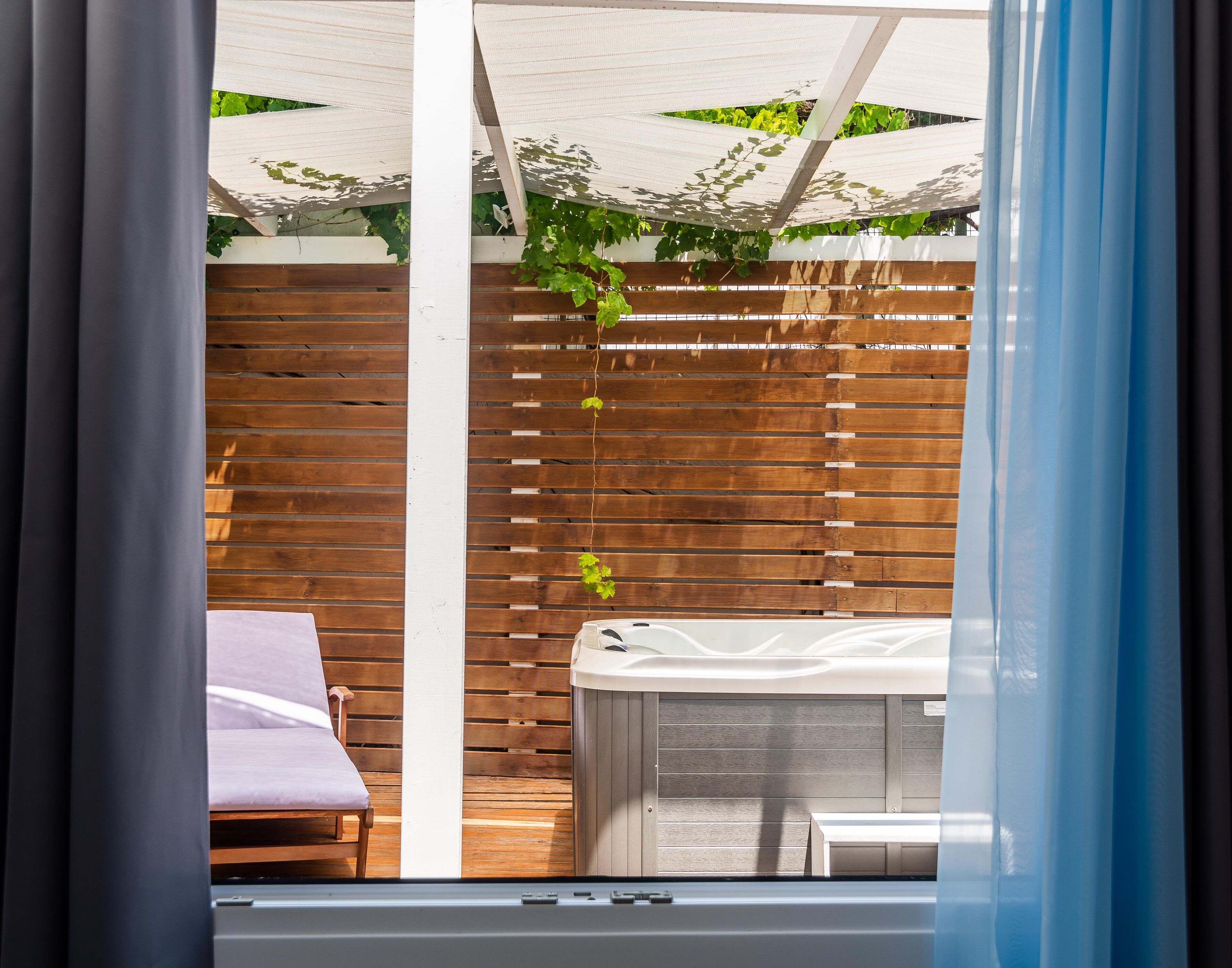 superior triple room, hot tub | view from room