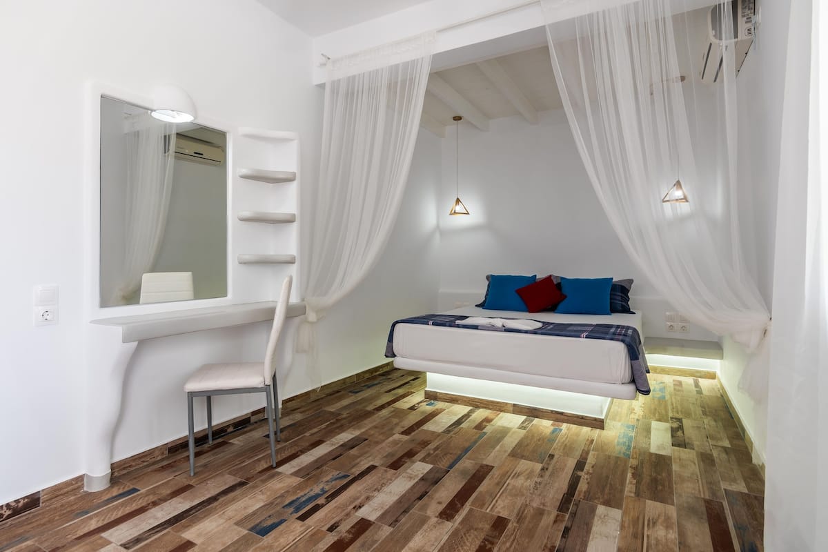 junior suite | 1 bedroom, in-room safe, iron/ironing board, free wifi