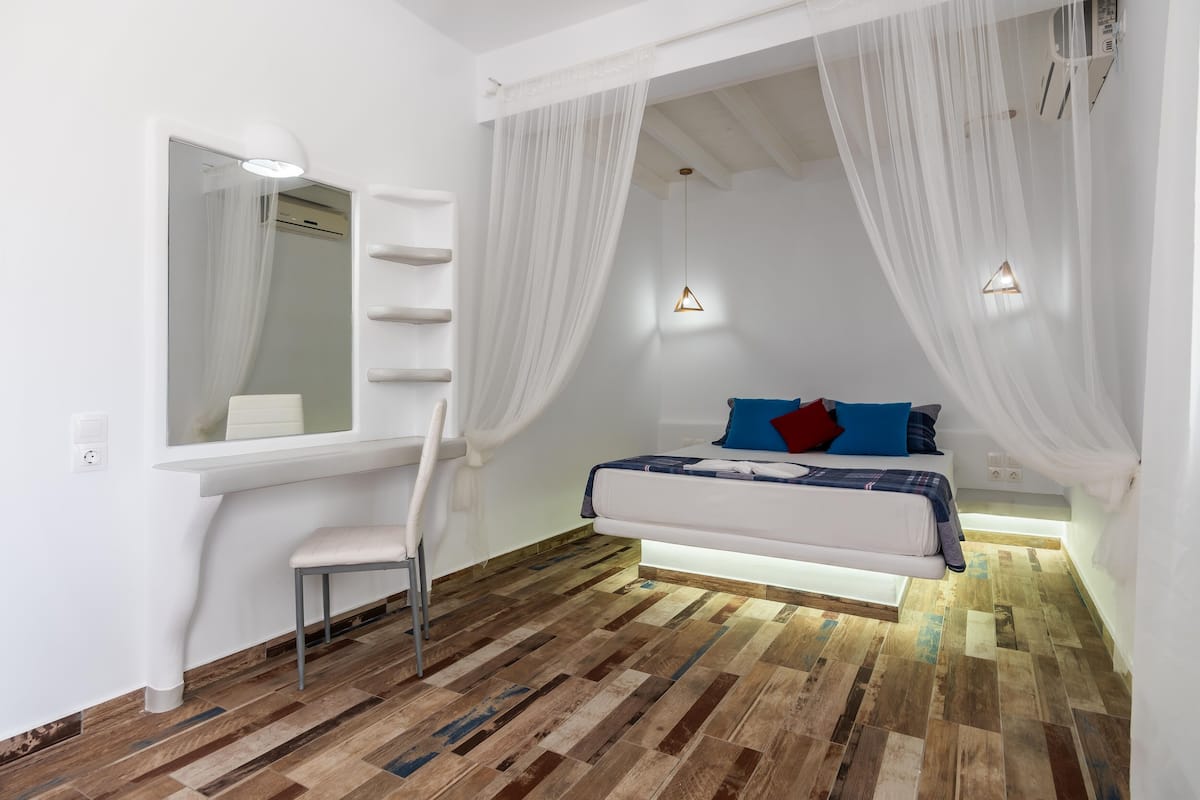Junior Suite | 1 bedroom, in-room safe, iron/ironing board, free WiFi