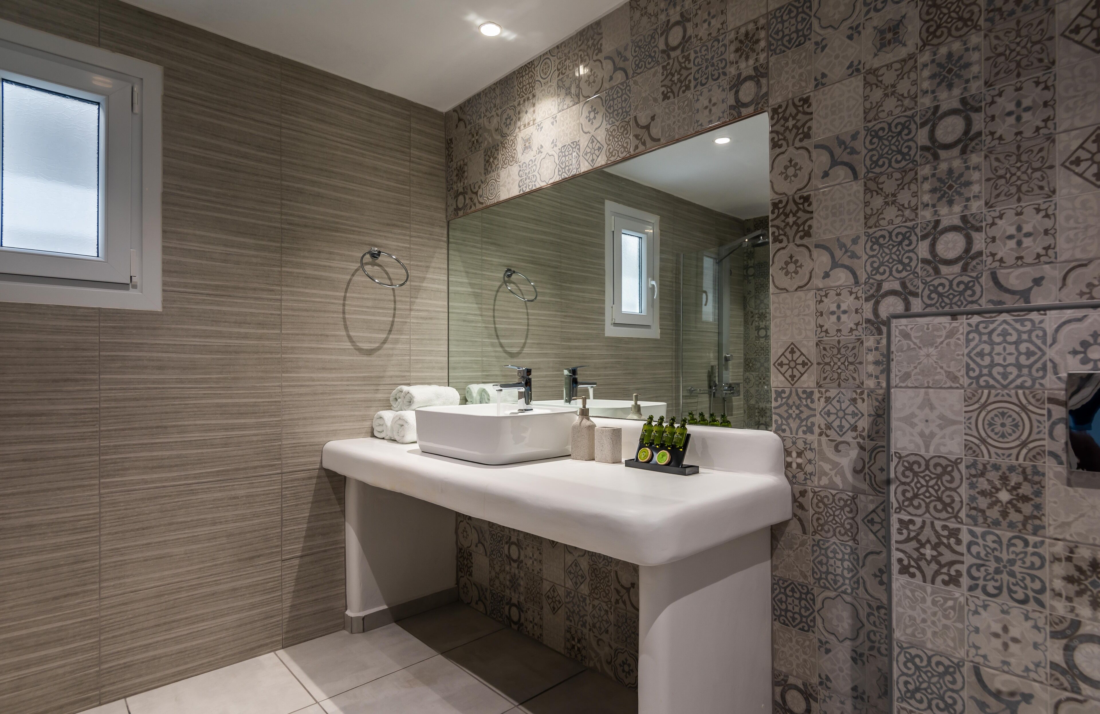 junior suite | bathroom | shower, rainfall showerhead, free toiletries, hair dryer