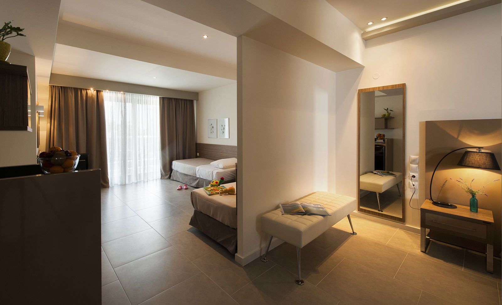 family room, partial sea view | in-room safe, desk, soundproofing, iron/ironing board