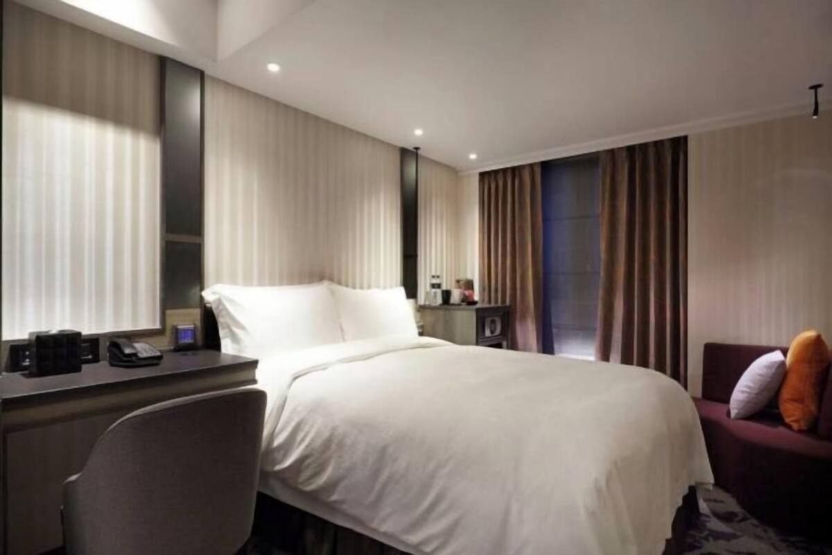 Premium bedding, down duvets, pillow-top beds, in-room safe
