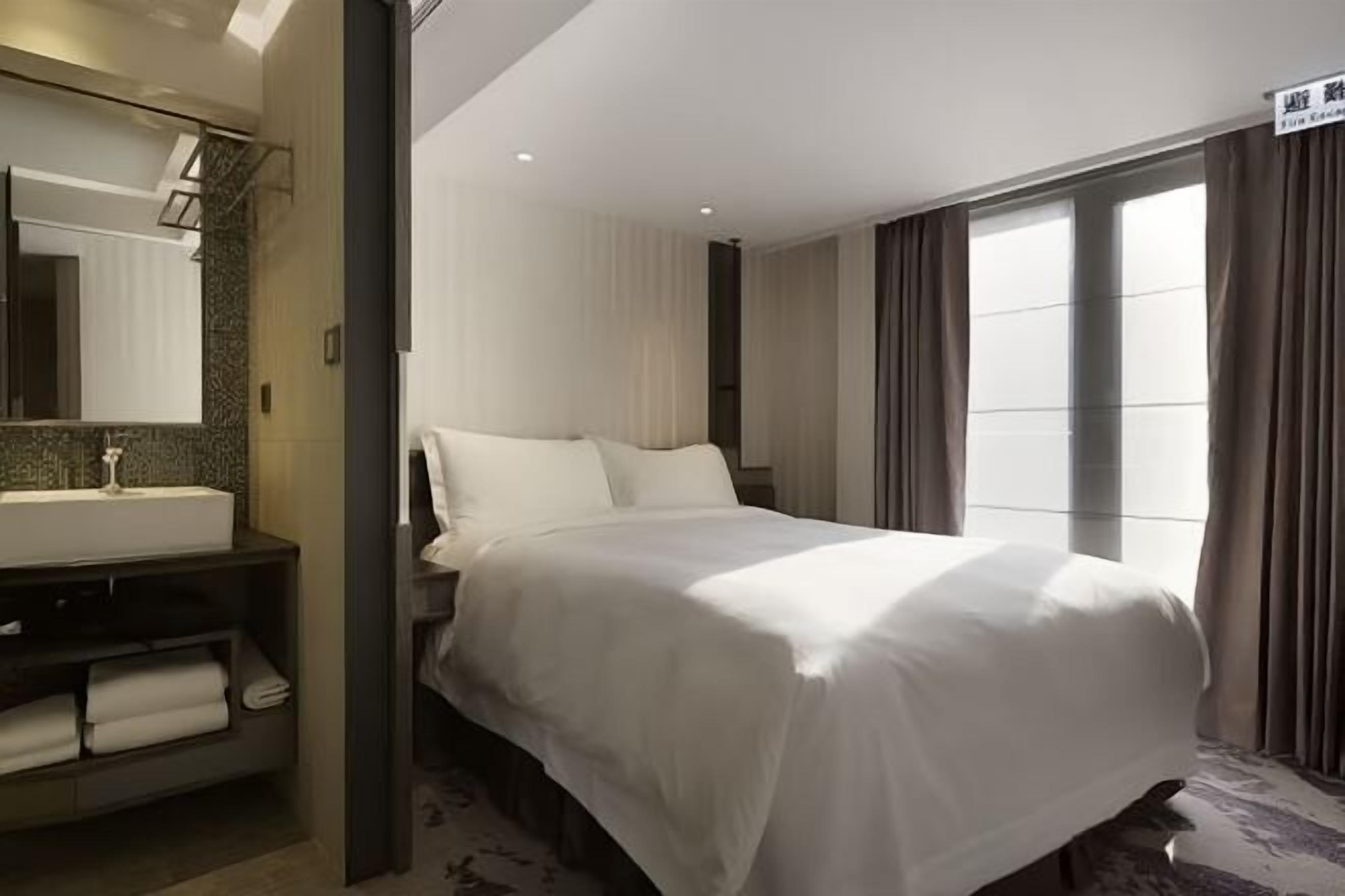 Premium bedding, down comforters, pillowtop beds, in-room safe