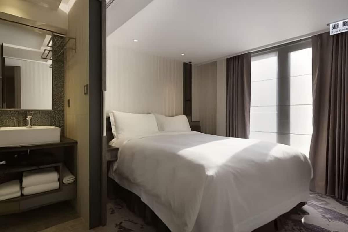Premium bedding, down duvets, pillow-top beds, in-room safe