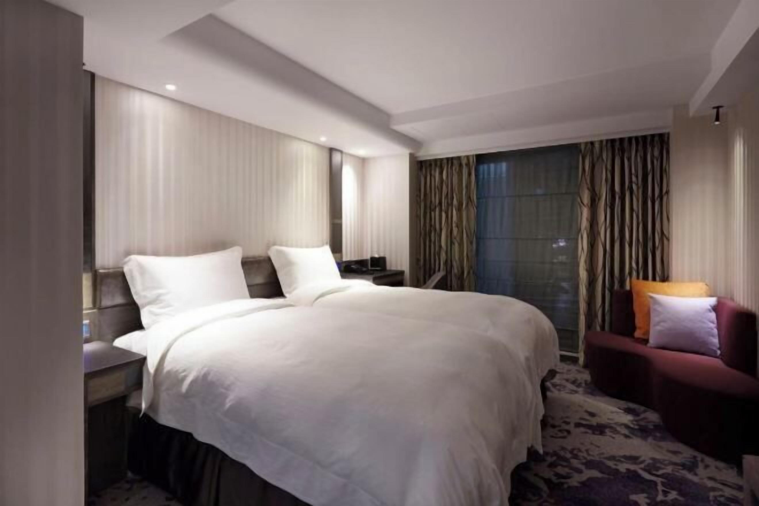 Premium bedding, down comforters, pillowtop beds, in-room safe