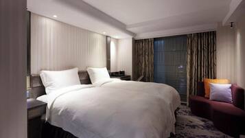 Deluxe Twin Room | Premium bedding, down comforters, pillowtop beds, in-room safe