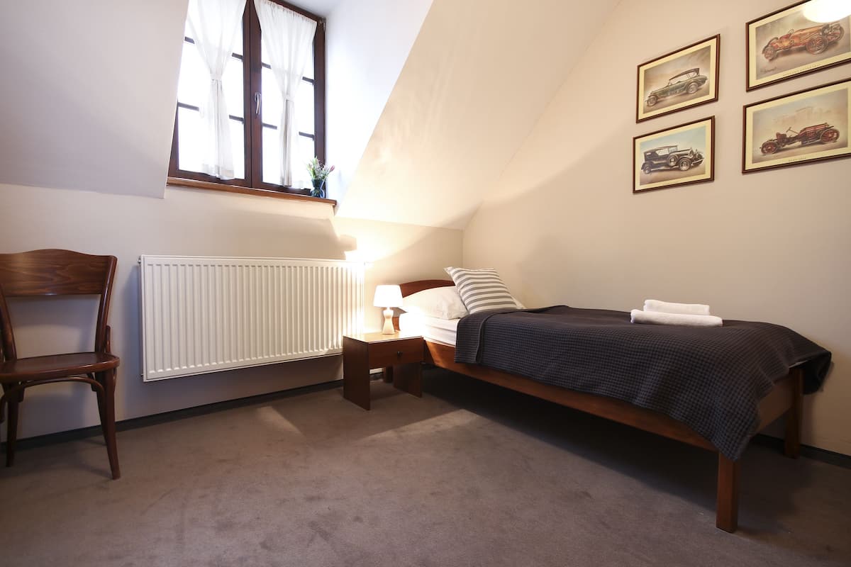 Single Room | Desk, blackout curtains, iron/ironing board, free cots/infant beds