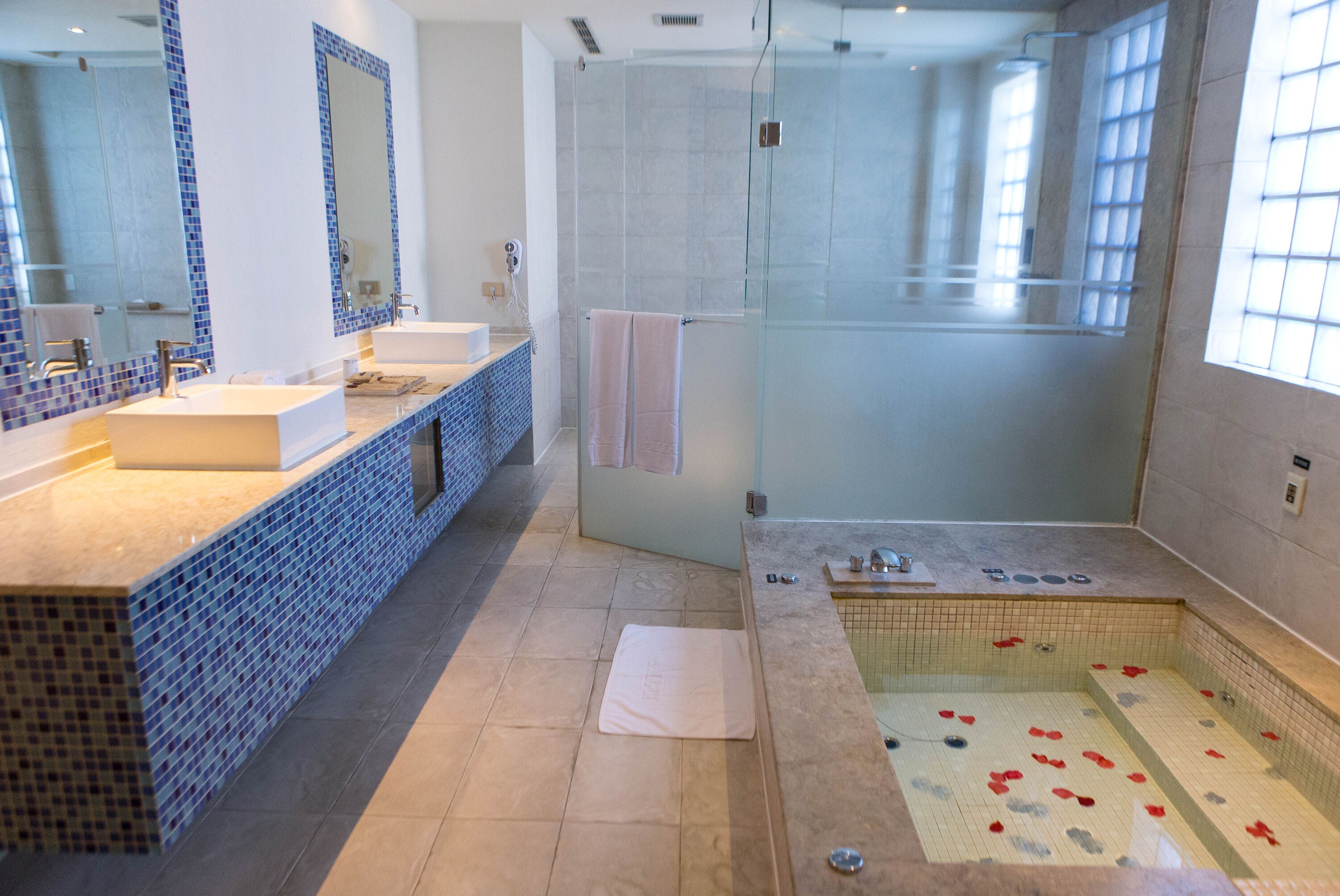 flagship suite check in time starts from 6pm | bathroom | separate bathtub and shower, free toiletries, hair dryer, slippers