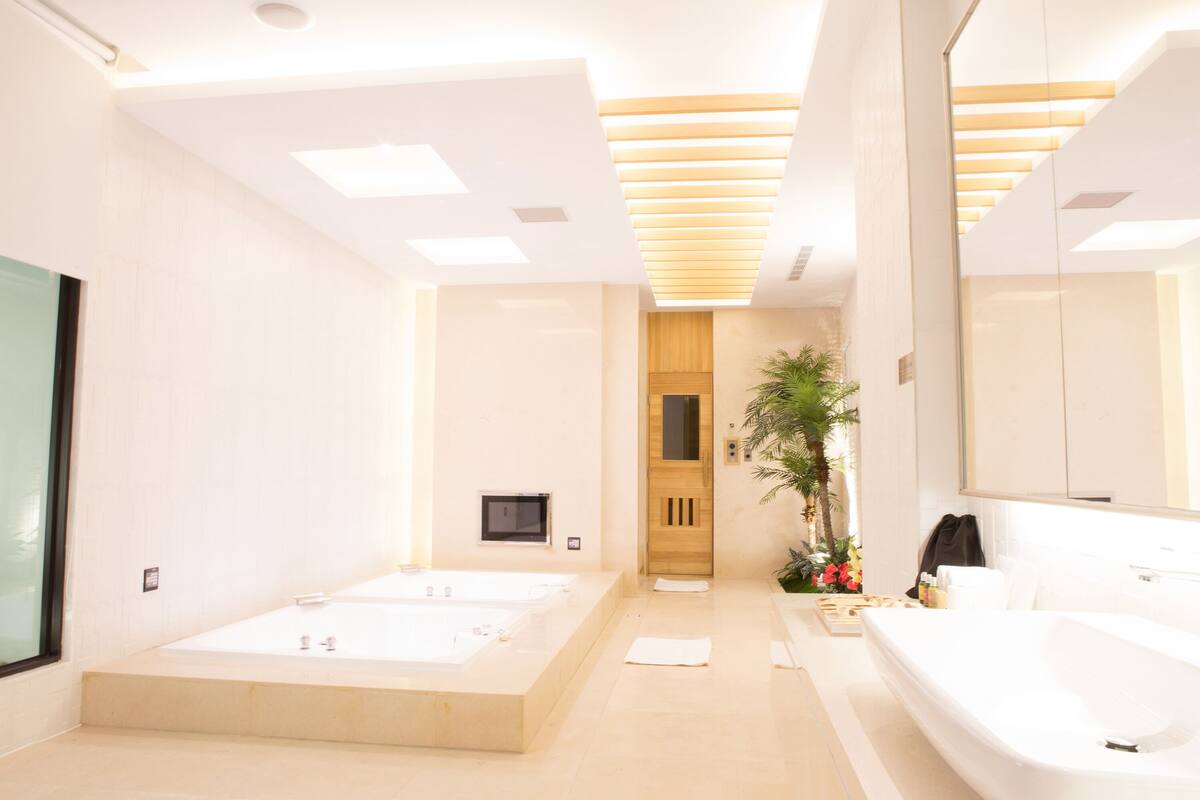 vip suite (check in time starts from 6pm) | bathroom | separate bathtub and shower, free toiletries, hair dryer, slippers