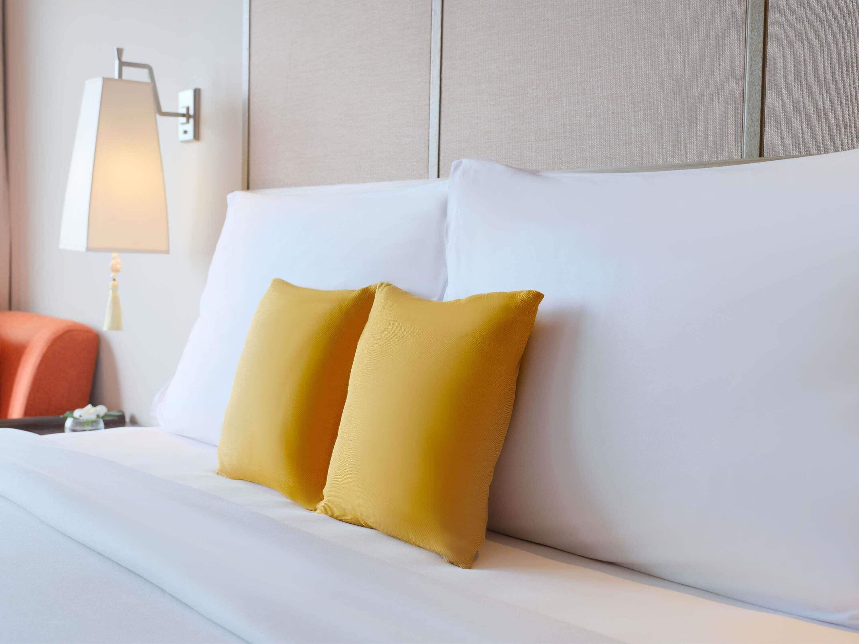 Down comforters, pillowtop beds, in-room safe, desk