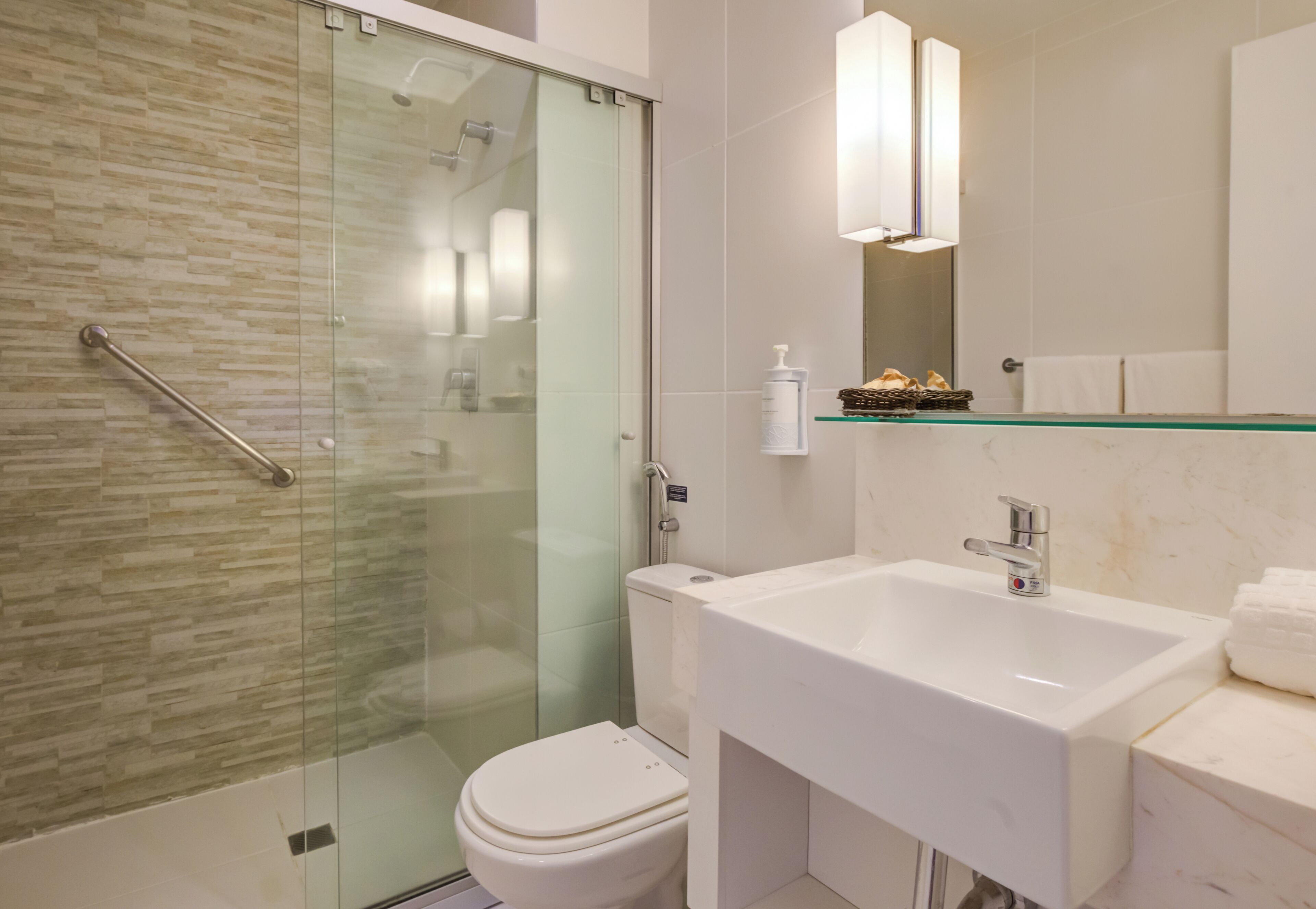 superior twin room | bathroom | shower, hair dryer, towels