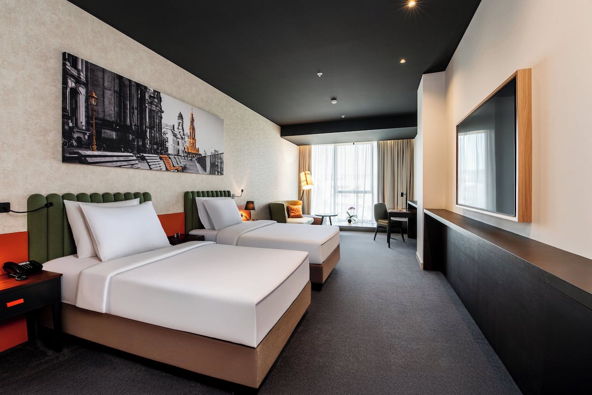 Habitación Premium, 2 camas individuales | Ropa de cama hipoalergénica y minibar