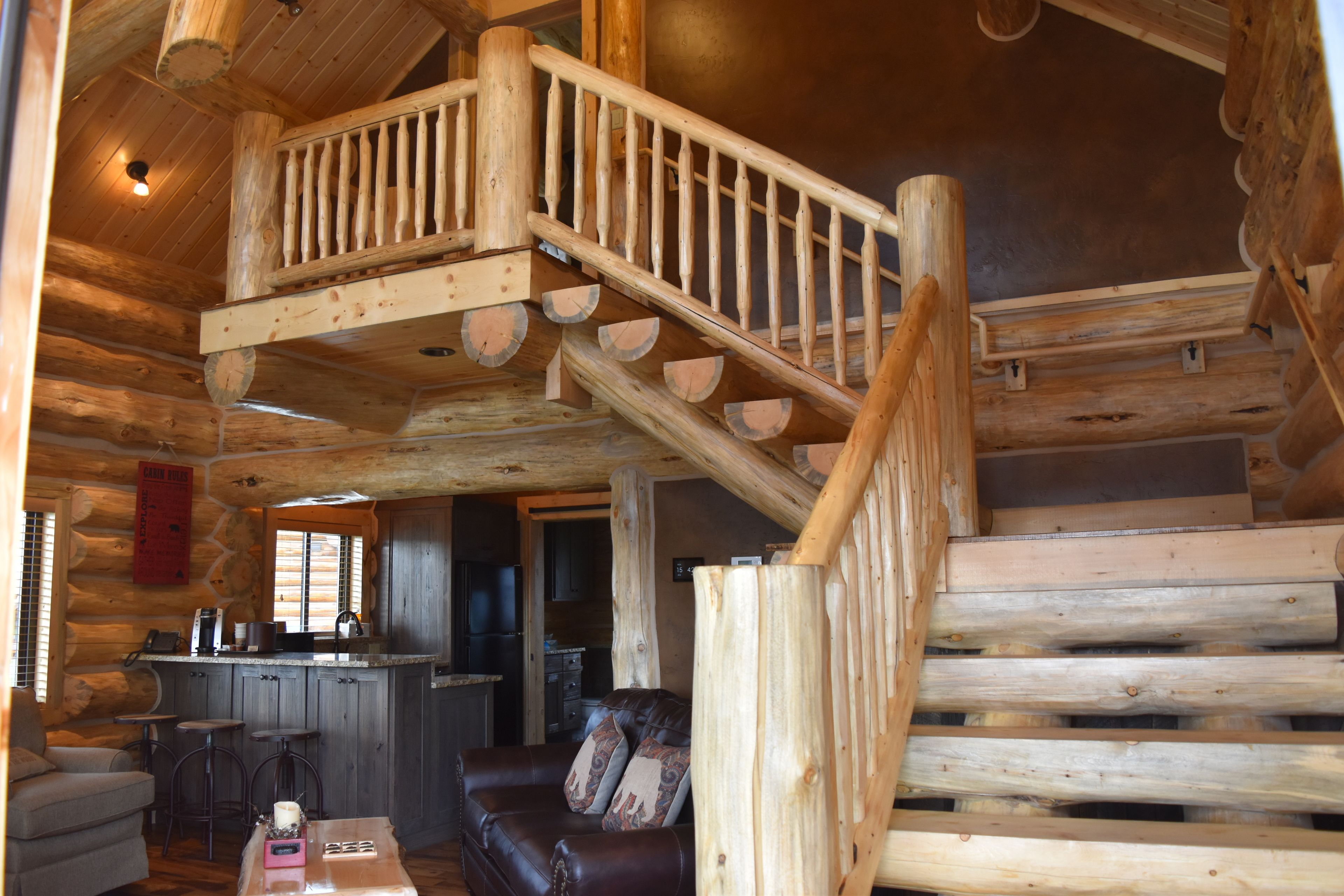 family adventure cabin | living area | flat-screen tv, fireplace
