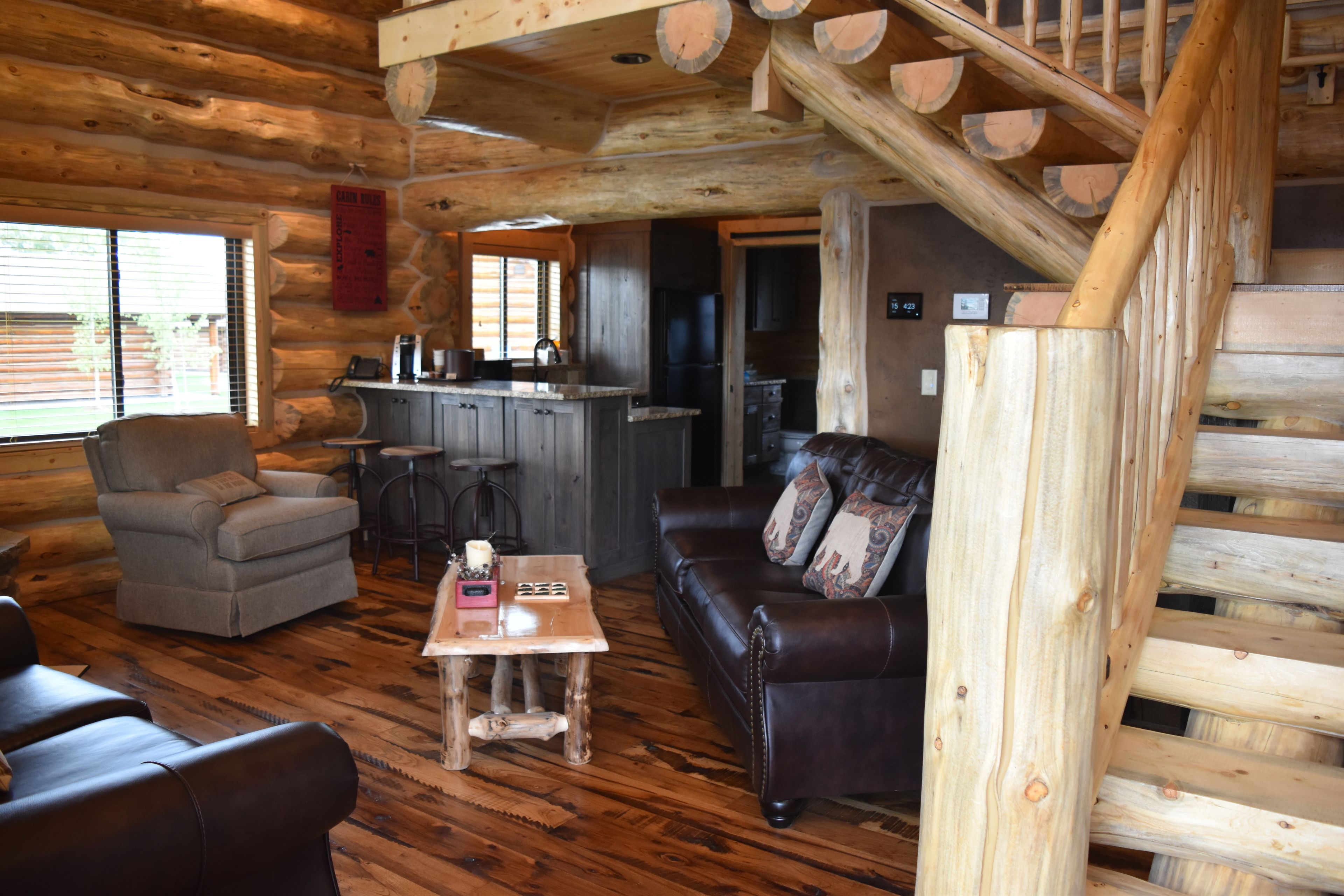 family adventure cabin | living area | flat-screen tv, fireplace