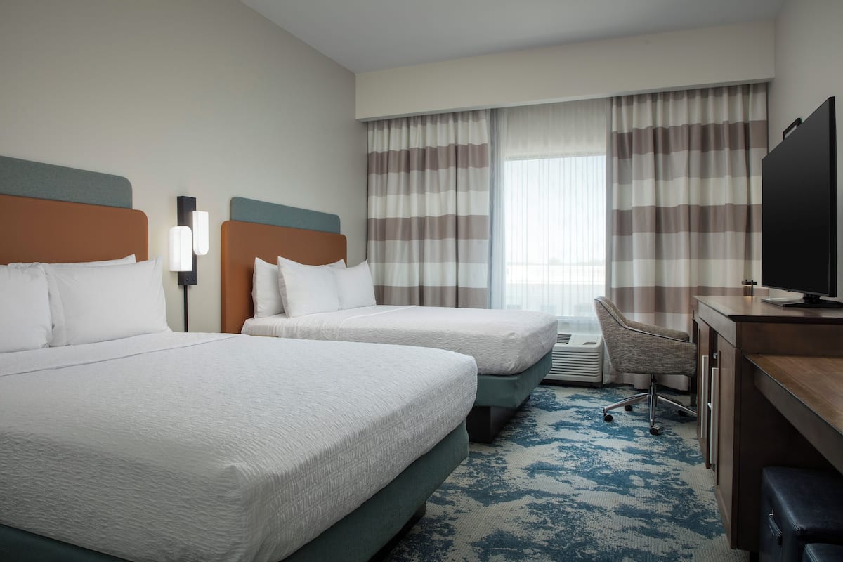 Desk, laptop workspace, blackout drapes, iron/ironing board