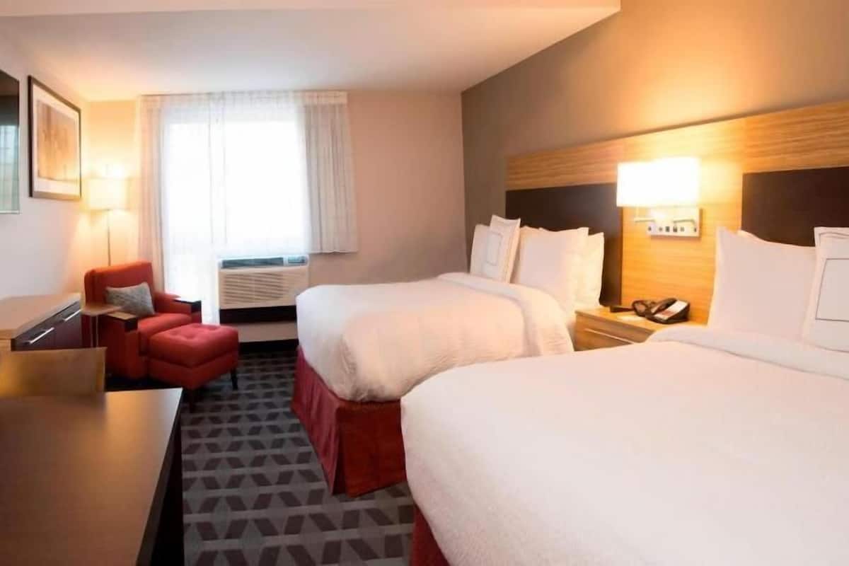 Desk, blackout drapes, iron/ironing board, free wired internet