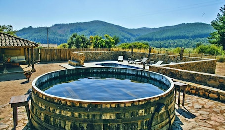 Seasonal outdoor pool, pool umbrellas, pool loungers. Casa Bouchon Hotel Boutique