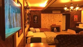 Chambre Familiale, plusieurs lits | 1 chambre, bureau, fer et planche à repasser, Wi-Fi gratuit