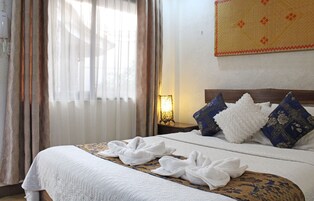 Espacio para trabajar con laptop, wifi gratis y ropa de cama 