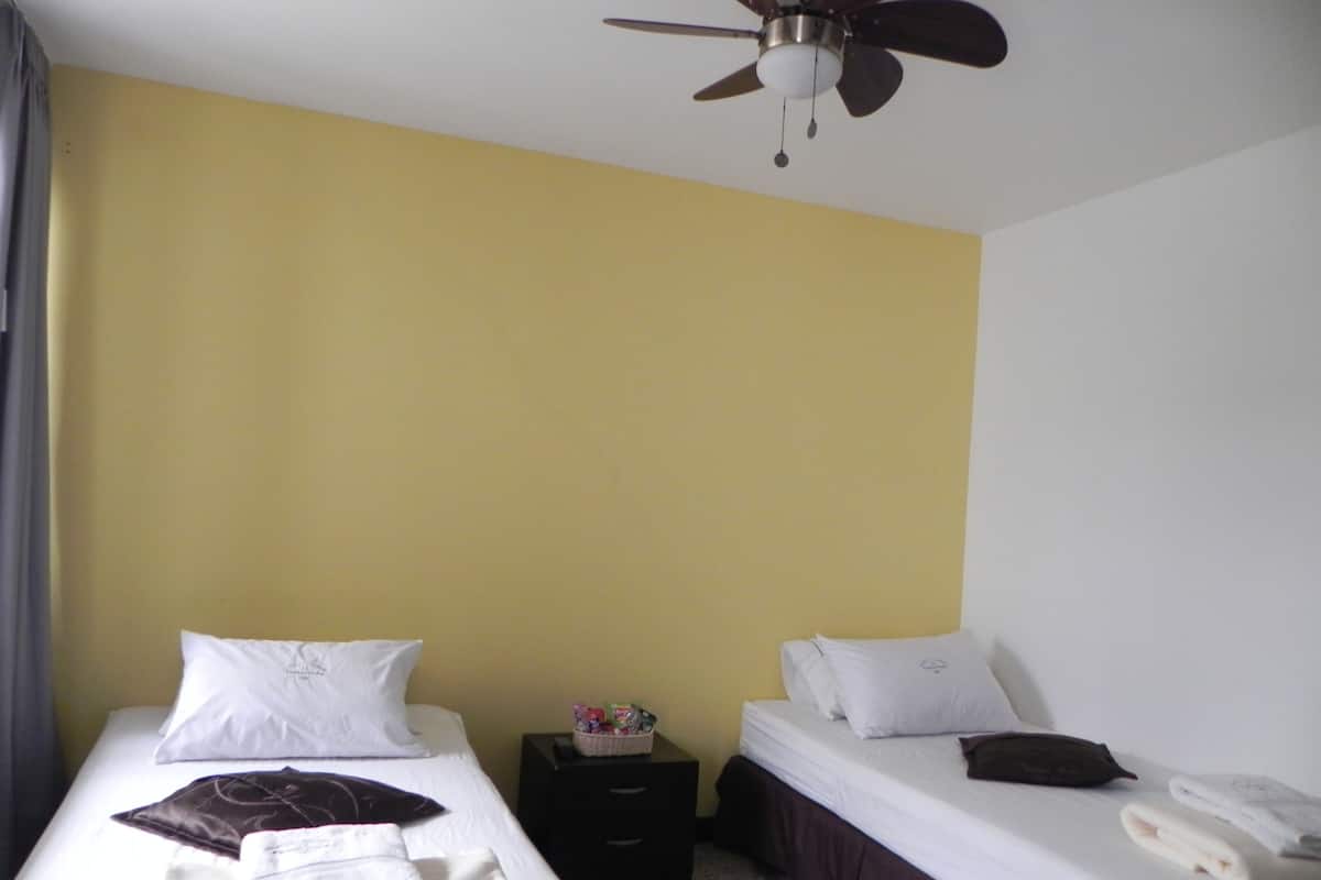 Twin Room | Iron/ironing board (on request), WiFi (free)