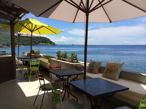 Breakfast, lunch, dinner served; international cuisine, beach views 