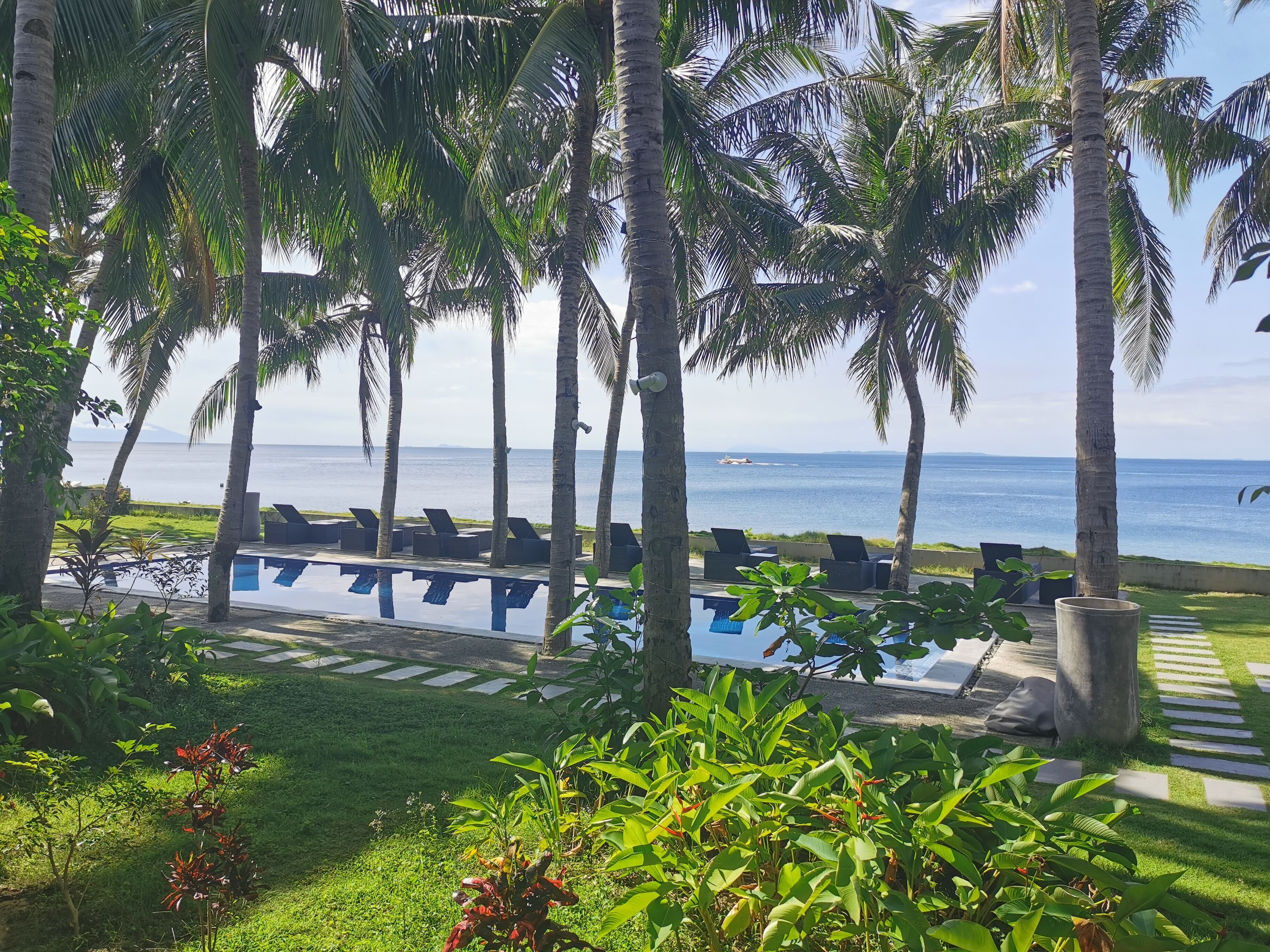 outdoor pool, pool umbrellas, pool loungers