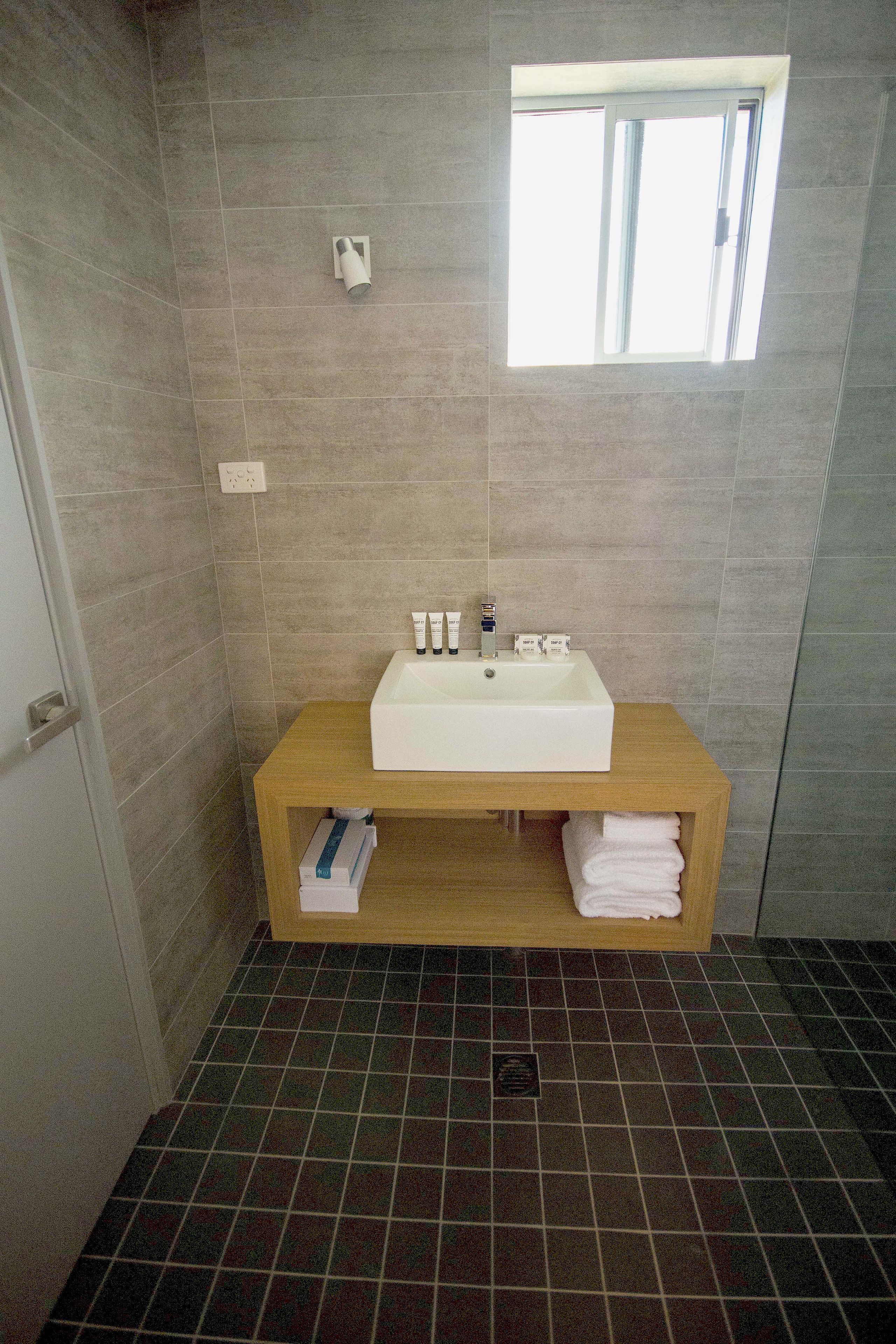 king room | bathroom | shower, free toiletries, hair dryer, towels