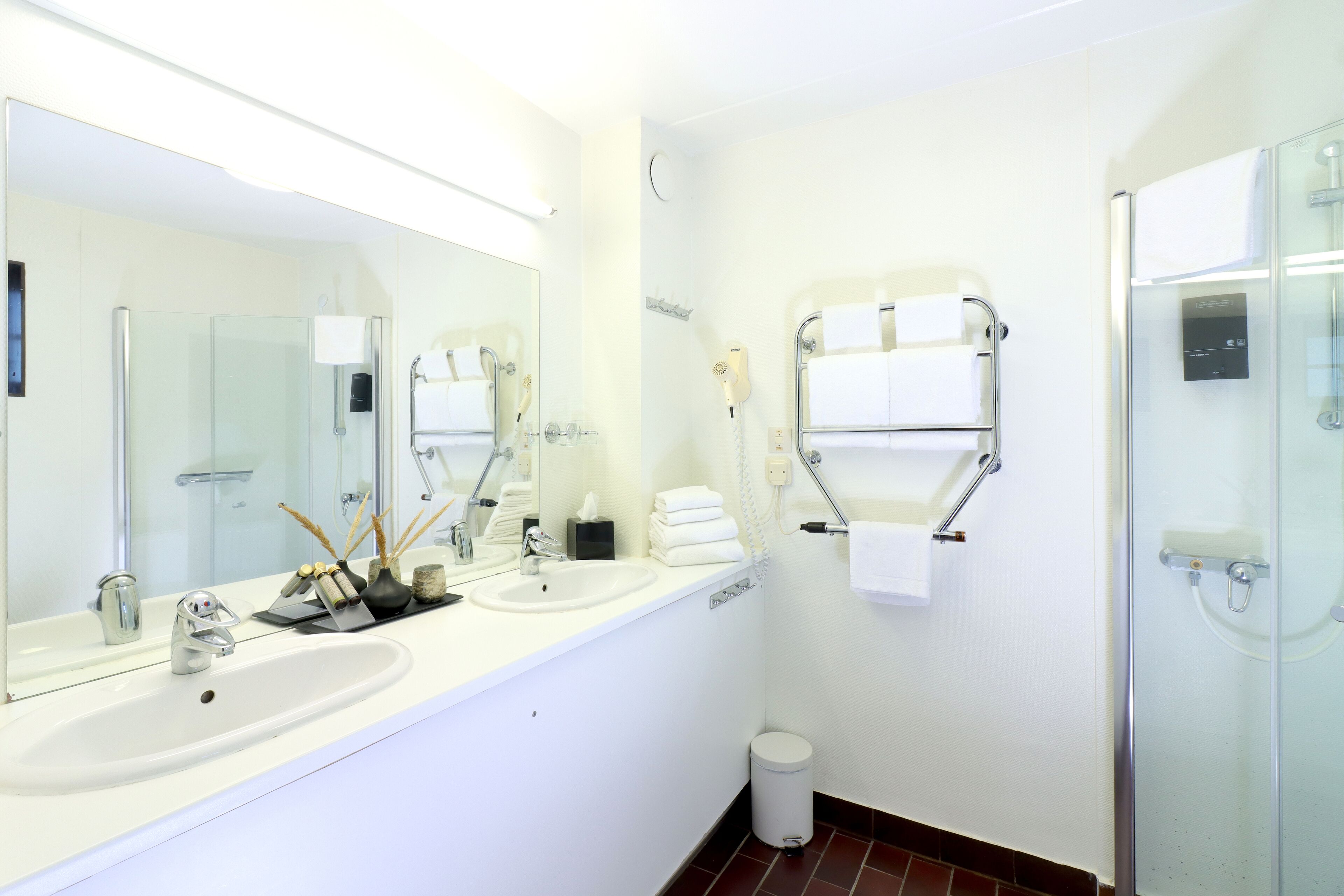 shower, free toiletries, bathrobes, slippers