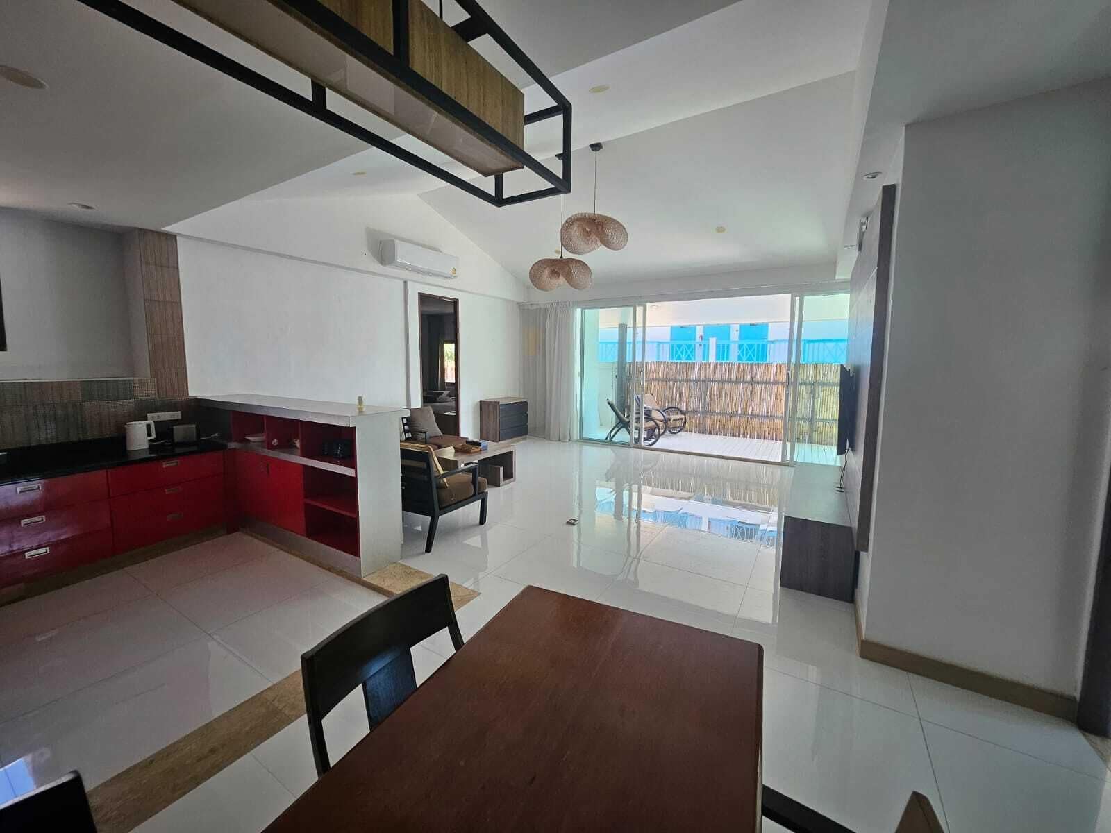 2 bedroom villa | Living area | 55-inch flat-screen TV with digital channels, pay movies, offices