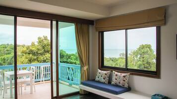 Deluxe Double Room, 1 Double Bed, Partial Sea View | 3 bedrooms, in-room safe, individually furnished, blackout drapes