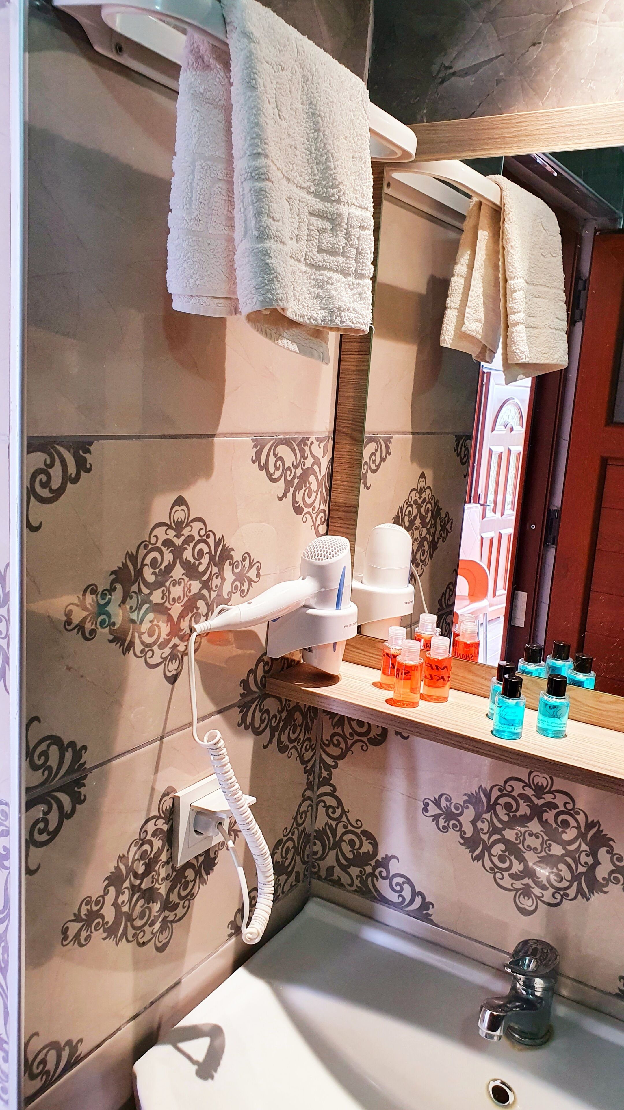 shower, free toiletries, hair dryer, slippers