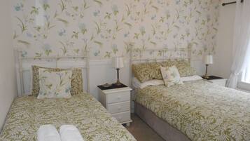 4 bedrooms, premium bedding, desk, iron/ironing board