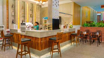 Breakfast, lunch, dinner served; international cuisine