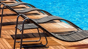 Outdoor pool, pool umbrellas, pool loungers