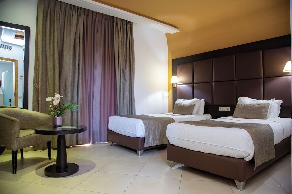 standard twin room | premium bedding, in-room safe, desk, blackout curtains