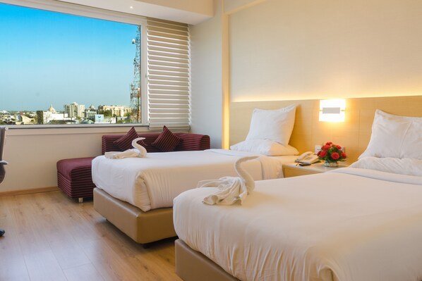 Standard-huone, kaupunkinäköala, torni | Ylelliset vuodevaatteet, minibaari, tallelokero huoneessa