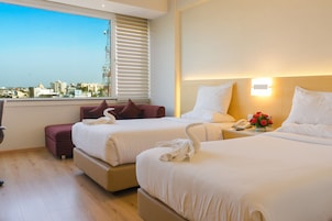 Ropa de cama de alta calidad y minibar