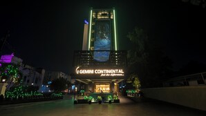 A hotel with a prominent sign reading "Gemini Continental" and a large illuminated display above the entrance. - Gemini Continental Lucknow (Lucknow)